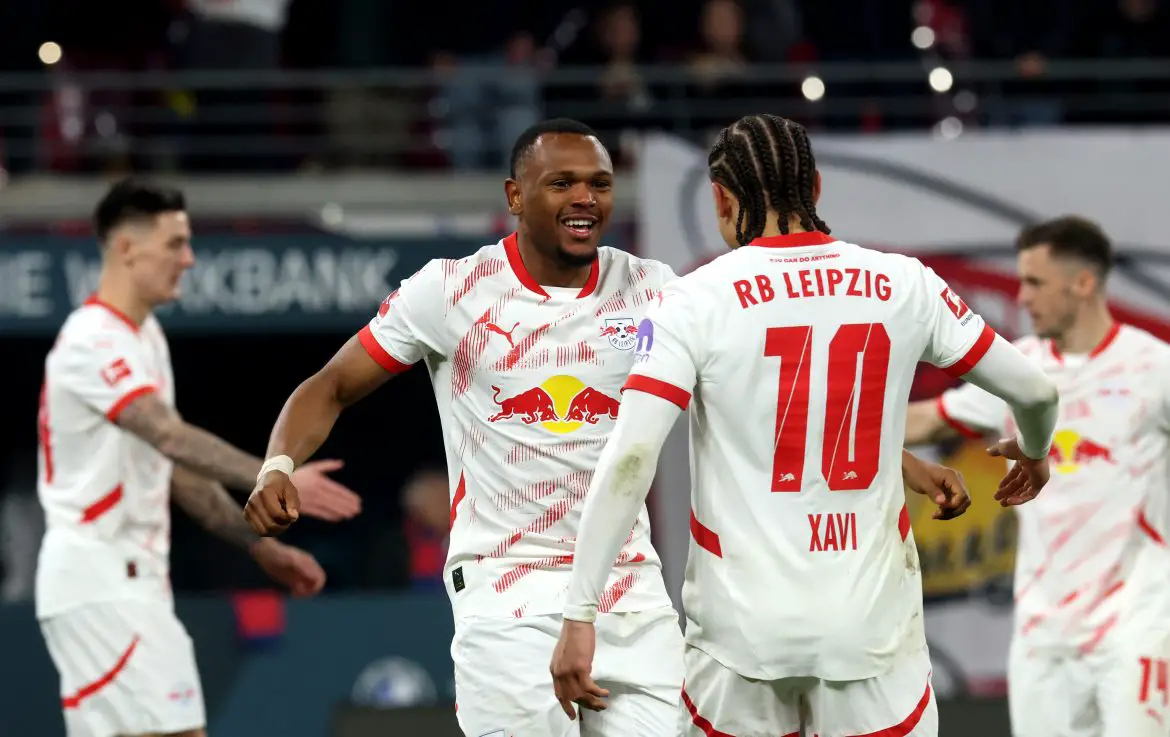 Xavi Simons and Loïs Openda celebrate the Belgian's goal to make it 2-0.