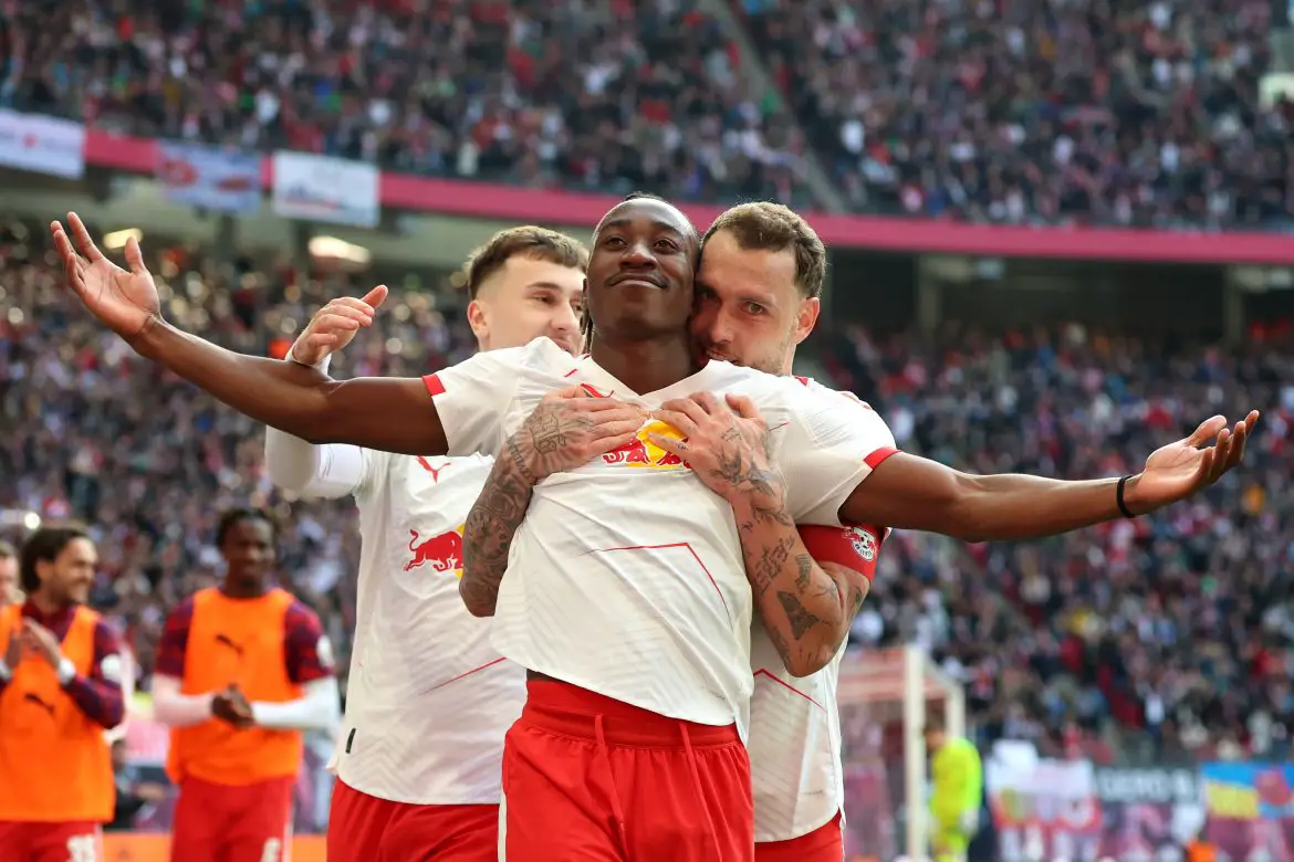 Yan Diomande celebrates scoring for RB Leipzig.