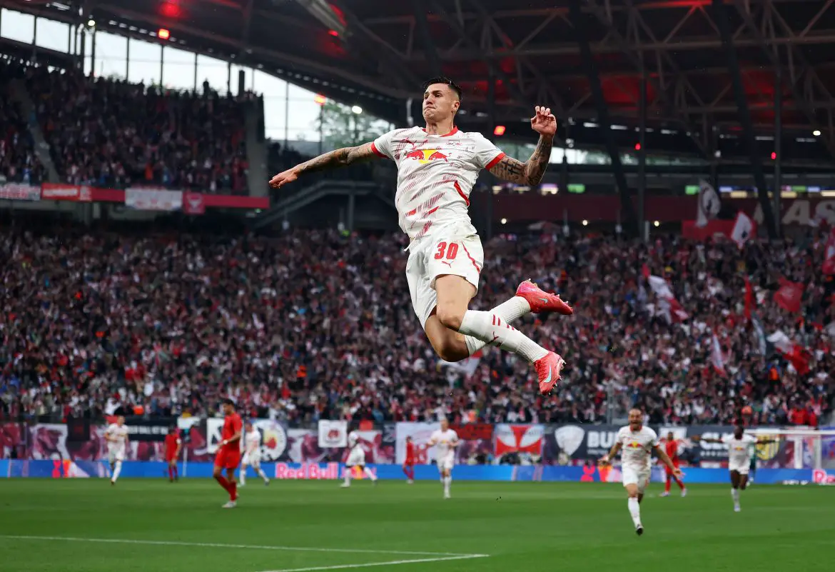 Benjamin Sesko of RB Leipzig celebrates scoring against Bayern Munich in the Bundesliga.