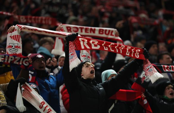 RB Leipzig fans displaying their scarves prior to a Bundesliga match.