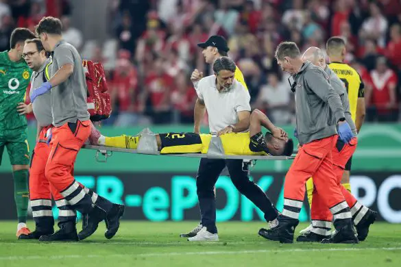 Yan Couto of Borussia Dortmund was stretchered off in their DFB Pokal win against Rot-Weiss Essen.