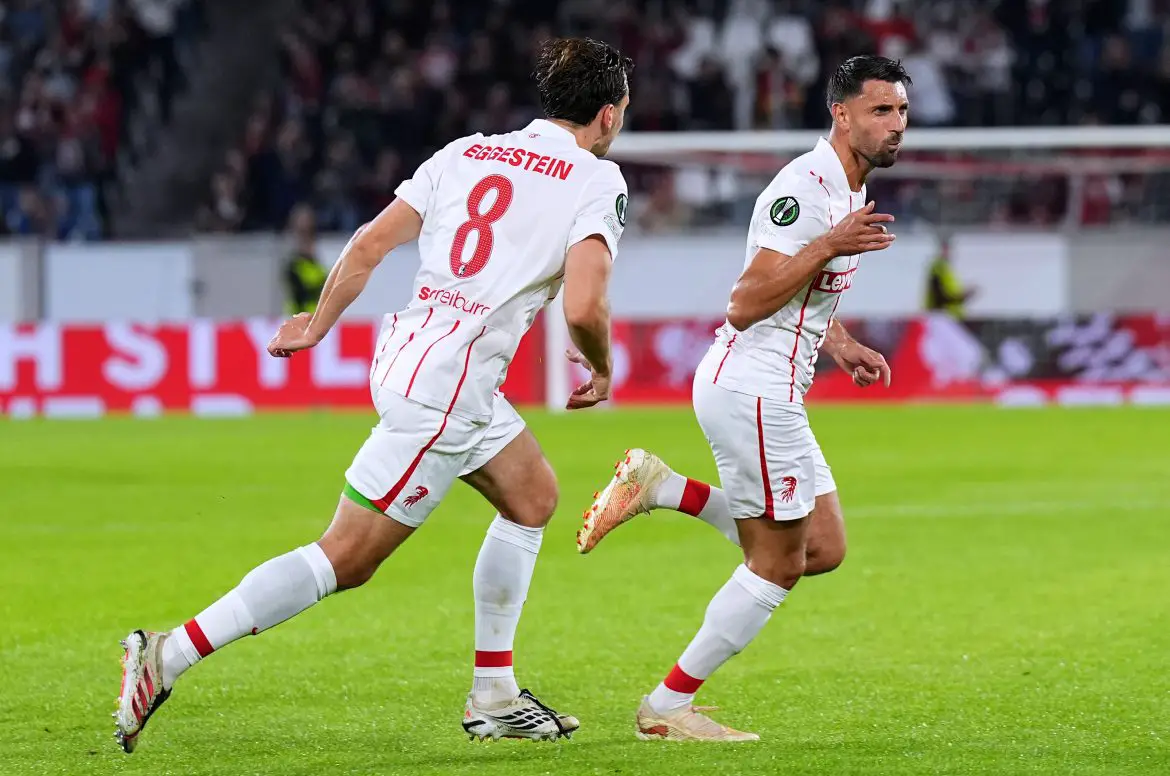Freiburg teammates Maximilian Eggestein (left) and Vincenzo Grifo (right) celebrate scoring a goal in Thursday night's Conference League fixture.