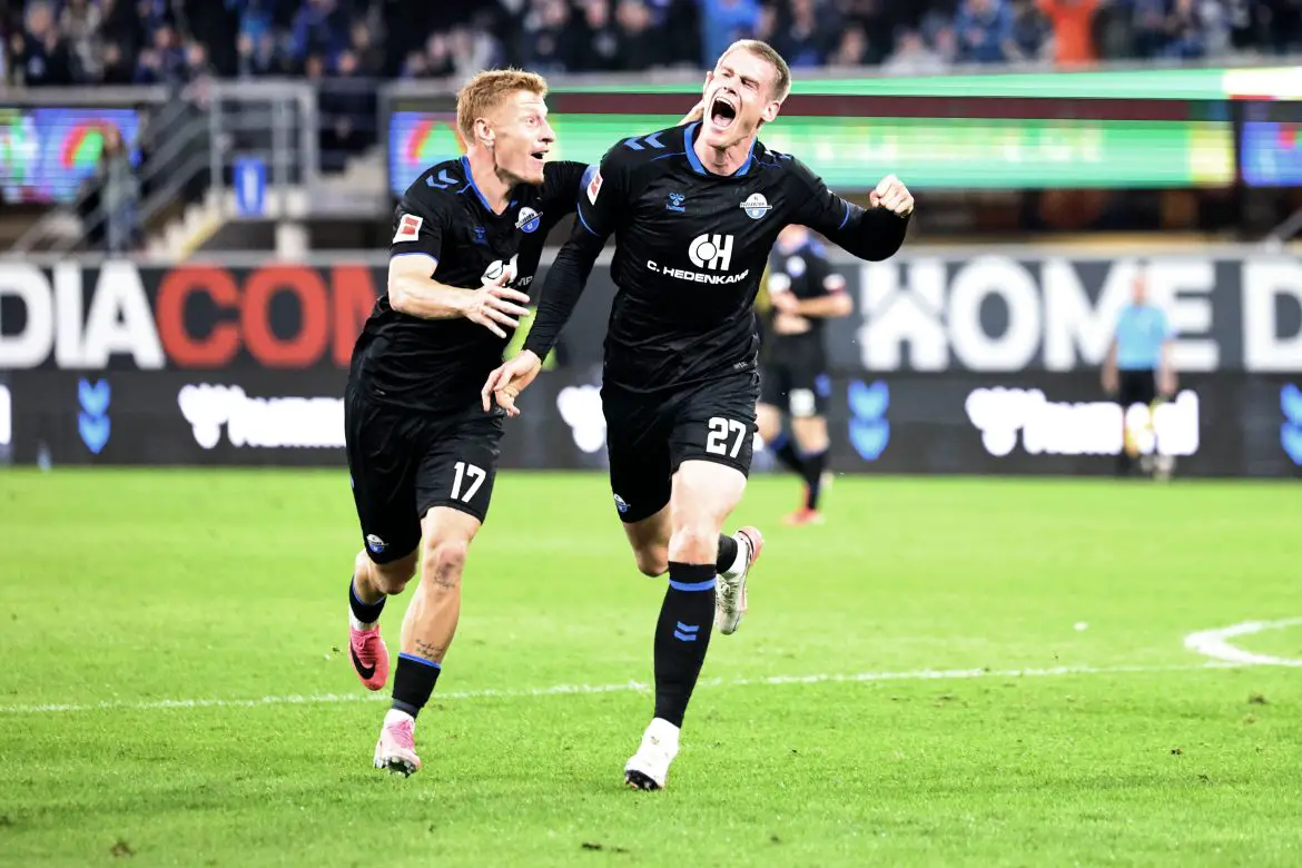 Paderborn striker Steffen Tigges (right) celebrates scoring in the Bundesliga.