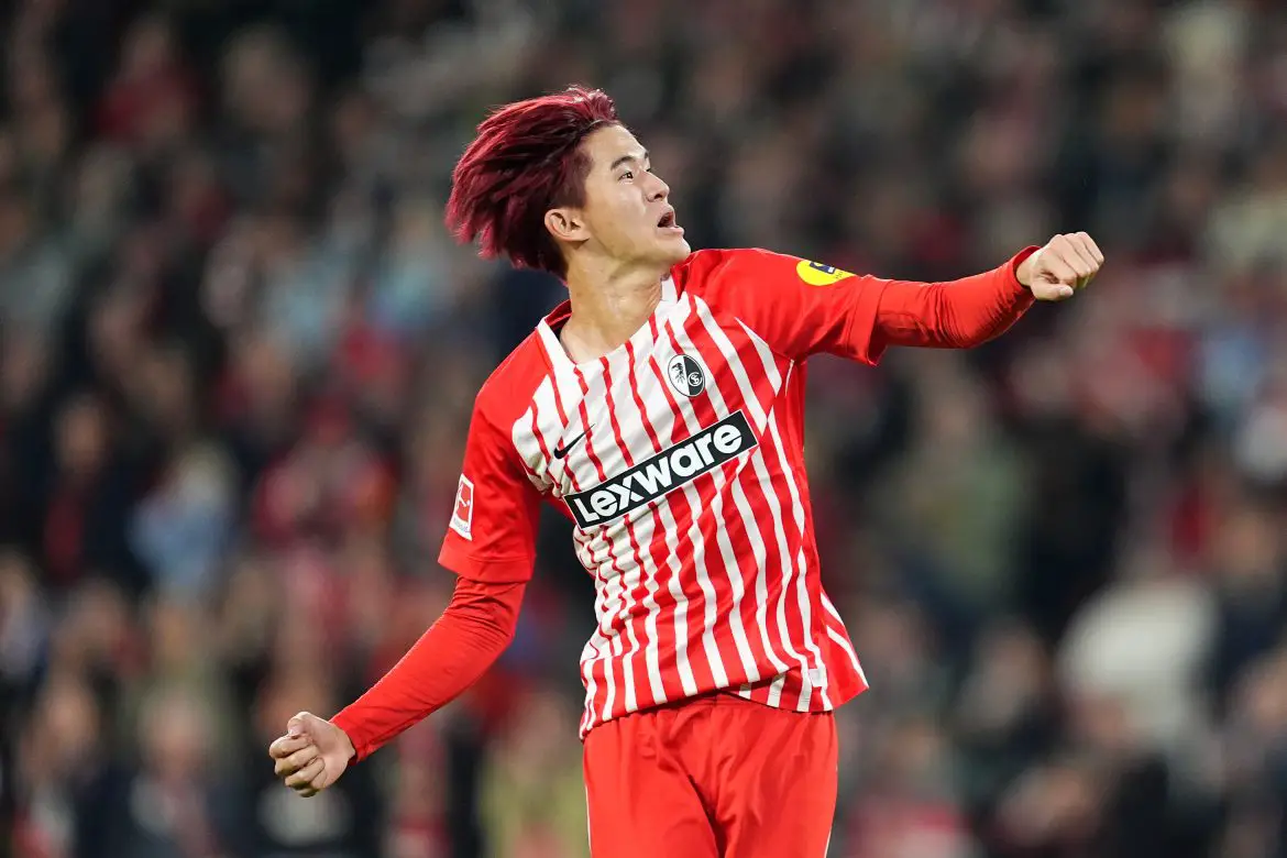 Freiburg's Keisuke Goto celebrates scoring the winning goal in his side's 2-1 Bundesliga victory over Schalke 04.