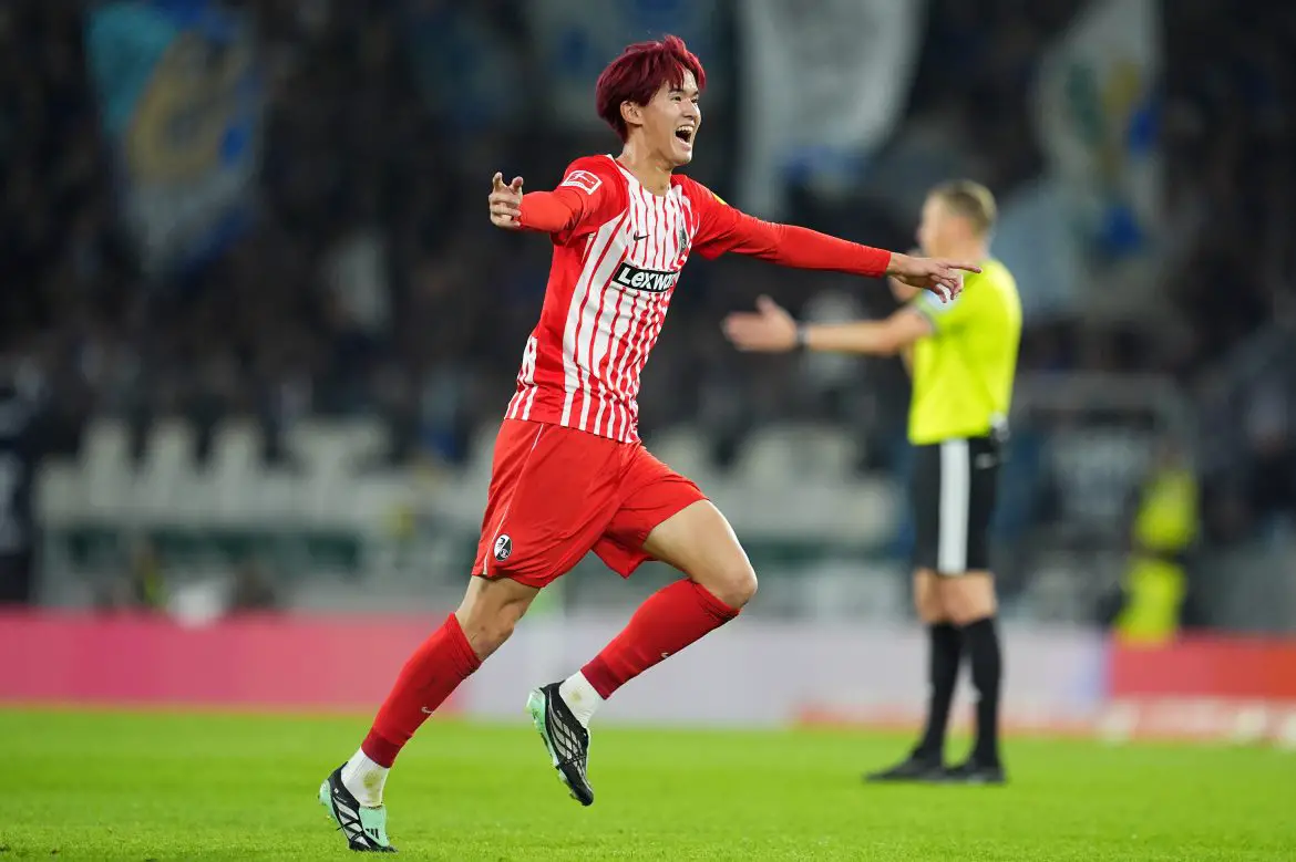 Freiburg's Keisuke Goto celebrates scoring his team's game-winning goal in Sunday's Bundesliga match.