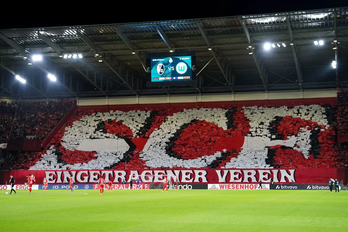 SC Freiburg fans show their support during Wednesday evening's DFB-Pokal fixture.