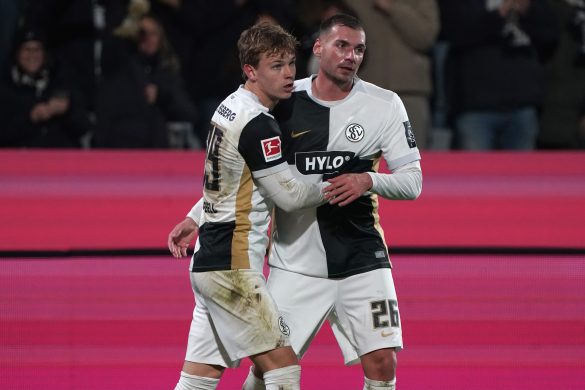 Cole Campbell (left) and Luca Sirch (right) celebrate after the former's Bundesliga goal on Friday evening.
