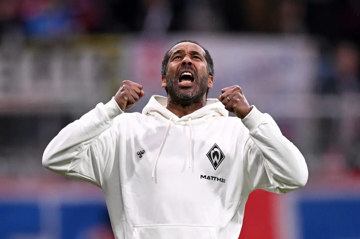 Werder Bremen head coach Daniel Thioune (51) celebrates his very first Bundesliga win.