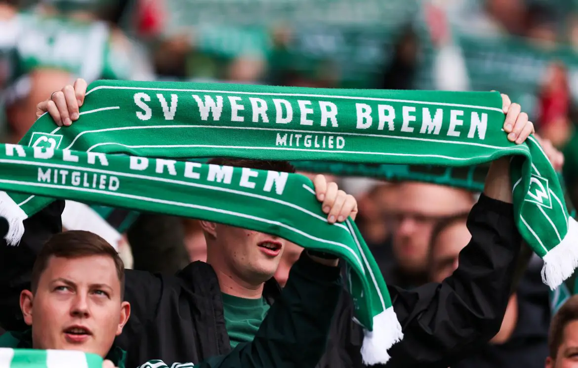 Werder Bremen fans support their club at the Weserstdion.