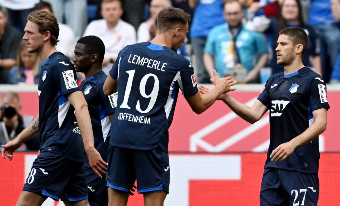 Hoffenheim players celebrate after scoring against Borussia Dortmund.