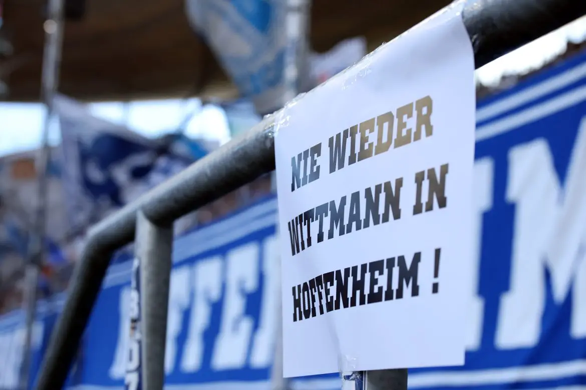 An anti-Roger Wittmann sign at Hoffenheim's PreZero Arena in Sinsheim.