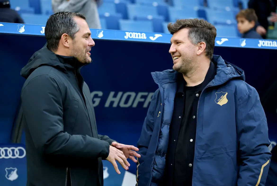 Hoffenheim sporting director Andreas Schicker (right) speaks with his RB Leipzig counterpart Marcel Schäfer (left) during a Bundesliga encounter on Saturday.