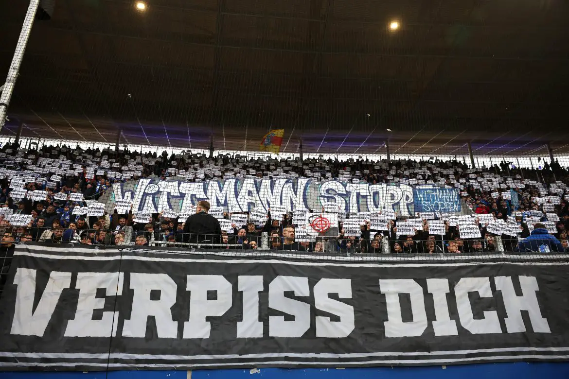 Hoffenheim supporters protest against the presence of controversial agent and Dietmar Hopp confidant Roger Wittmann.