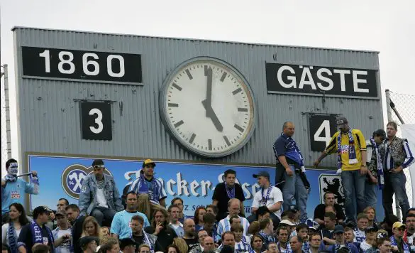 1860 Munich fans with the scoreboard at the Grunwalder Stadion.