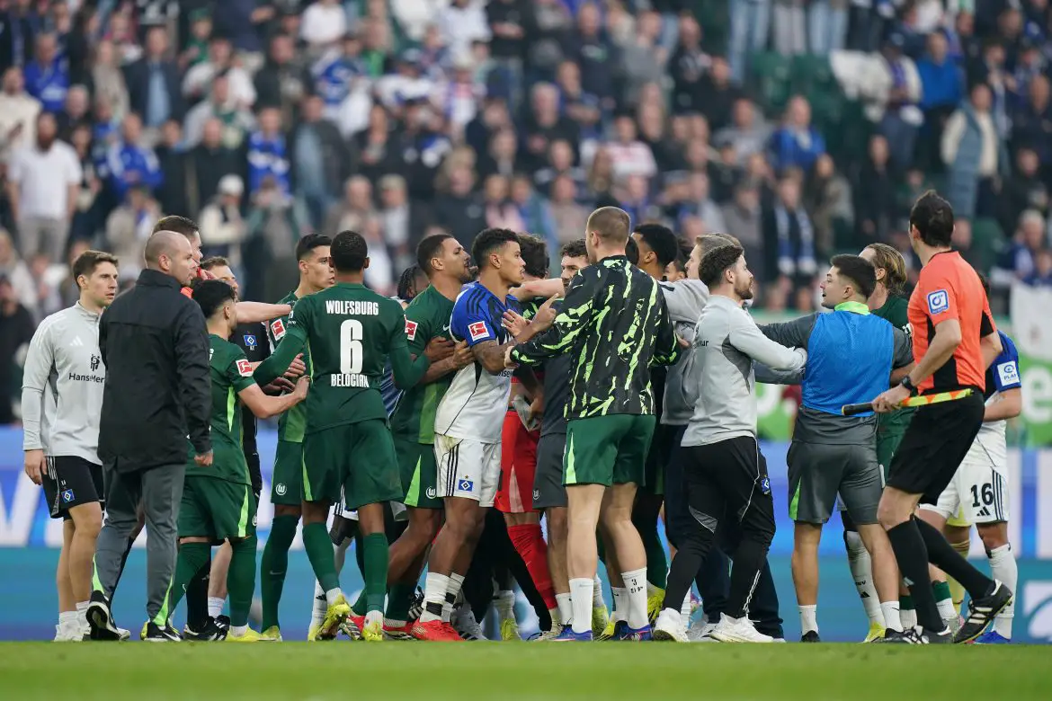 Hamburg and Wolfsburg players clash after the full time whistle at a Bundesliga match in Wolfsburg on Saturday afternoon.