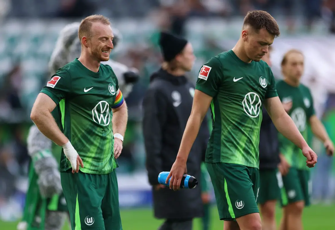 Wolfsburg captain Maximilian Arnold (left) looks dejected after his team's latest Bundesliga loss.